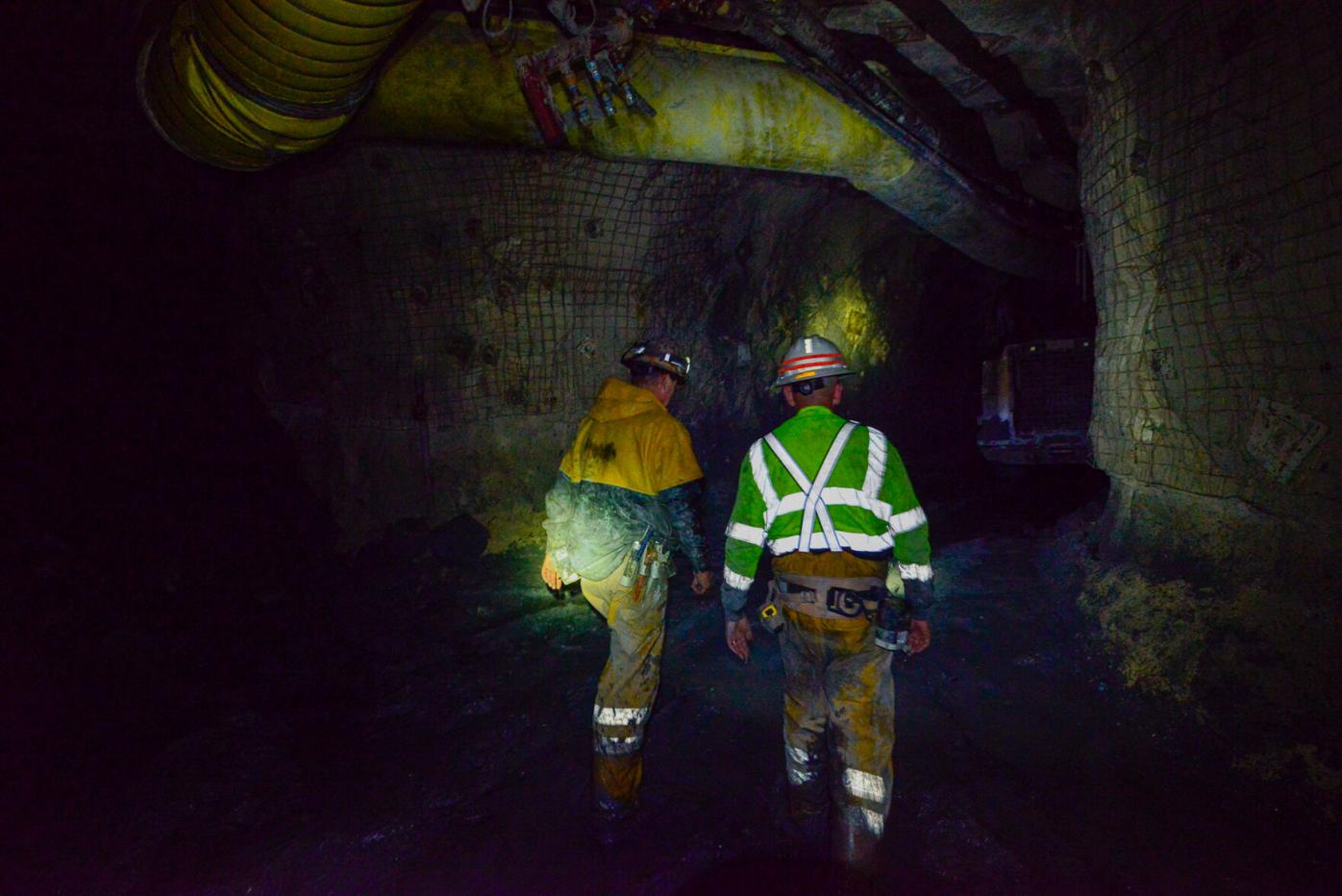 Miners move through tunnels at the Pinyon Plain Mine.jpg