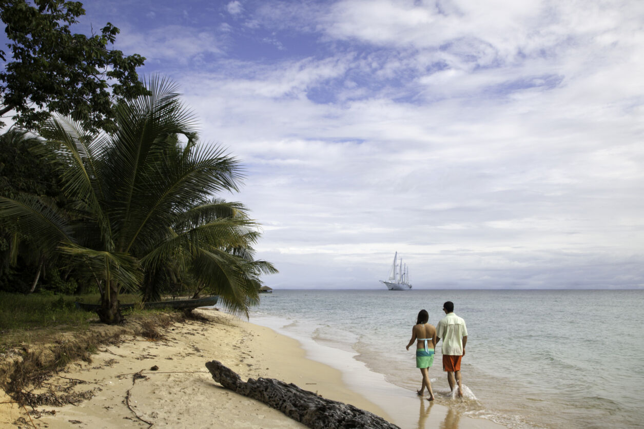 Couple walking on beach - Panama Canal