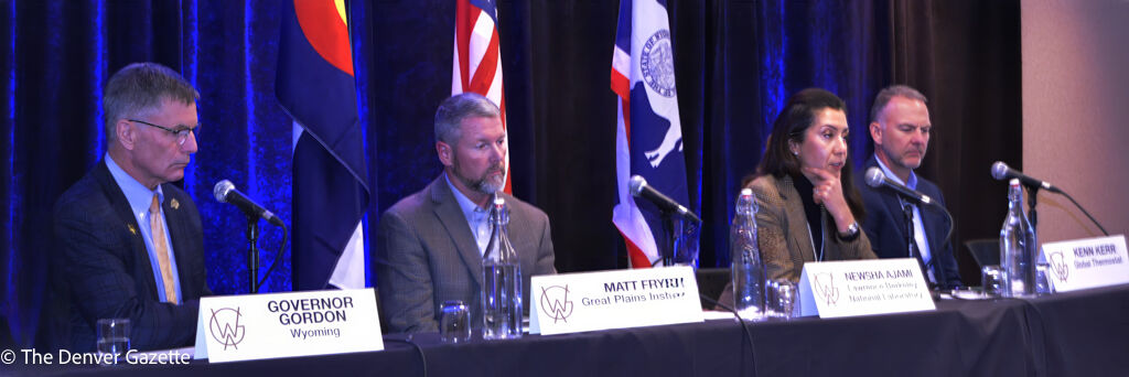 Panelists participate in a discussion at a Western Governors Association DAC workshop