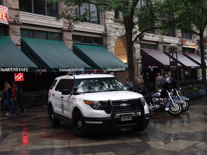 Denver Police SUV and Motorcycles park on promenade (copy)