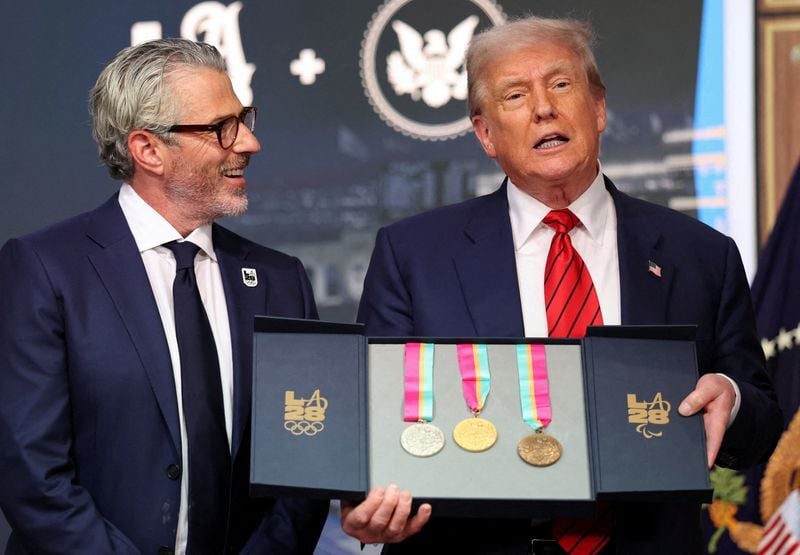 U.S. President Donald Trump signs an executive order, in Washington